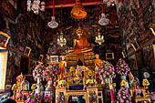 Bangkok Wat Arun - Main Buddha image inside the ubosot with two disciples.  